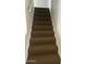 Carpeted staircase leading to the upper level at 4628 E Wood St, Phoenix, AZ 85040