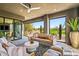 Relaxing outdoor patio with seating area and golf course views at 37200 N Cave Creek Rd # 1126, Scottsdale, AZ 85262
