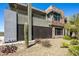 Contemporary home with desert landscaping and two-story design at 37200 N Cave Creek Rd # 1126, Scottsdale, AZ 85262