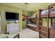 Fun bunk bed room with southwest decor and large TV at 37200 N Cave Creek Rd # 1126, Scottsdale, AZ 85262