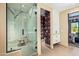 Spa-like bathroom with a large walk-in shower and marble tile at 37200 N Cave Creek Rd # 1126, Scottsdale, AZ 85262