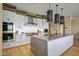 Gourmet kitchen featuring stainless steel appliances and a large island at 37200 N Cave Creek Rd # 1126, Scottsdale, AZ 85262