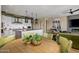 Bright dining area with a round table and access to a patio at 37200 N Cave Creek Rd # 1126, Scottsdale, AZ 85262
