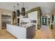 Modern kitchen with large island and stainless steel appliances at 37200 N Cave Creek Rd # 1126, Scottsdale, AZ 85262