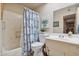Bathroom with shower/tub and blue and white decor at 10317 W Prairie Hills Cir, Sun City, AZ 85351