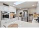 Updated kitchen featuring stainless steel appliances and an island at 10317 W Prairie Hills Cir, Sun City, AZ 85351