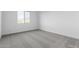 Spacious bedroom with grey carpet and window at 7366 E White Tail Rd, San Tan Valley, AZ 85143