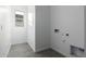 Laundry room with gray tile floor and utility hookups at 7366 E White Tail Rd, San Tan Valley, AZ 85143