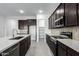 Modern kitchen with island and stainless steel appliances at 7366 E White Tail Rd, San Tan Valley, AZ 85143