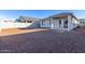 Backyard view of house, patio, and block wall at 7366 E White Tail Rd, San Tan Valley, AZ 85143