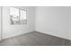 Bright bedroom with grey carpet and window at 7366 E White Tail Rd, San Tan Valley, AZ 85143