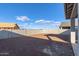 Large backyard with block wall and open space at 7366 E White Tail Rd, San Tan Valley, AZ 85143