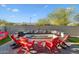 Built-in fire pit with seating and beautiful mountain views at 20428 W Elm Dr, Buckeye, AZ 85396