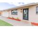 Charming single story home with modern front door at 7544 E Mckinley St, Scottsdale, AZ 85257