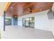 Spacious patio with wood ceiling and ceiling fans at 7544 E Mckinley St, Scottsdale, AZ 85257