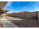 Landscaped backyard with a gravel area and pathway at 11511 E Monte Ave, Mesa, AZ 85209