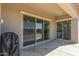 Covered patio with sliding glass doors leading to backyard at 15898 S 177Th Dr, Goodyear, AZ 85338