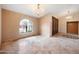 Bright living room with large window and chandelier at 591 E Park Ave, Gilbert, AZ 85234