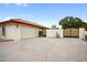 Attached garage with double gates and a large driveway at 591 E Park Ave, Gilbert, AZ 85234