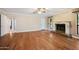 Living room with hardwood floors and fireplace at 591 E Park Ave, Gilbert, AZ 85234