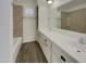 Bathroom with double sinks and a large mirror at 950 E 10Th Pl, Mesa, AZ 85203