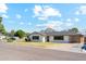 Mid-century modern home with landscaped yard and mountain view at 1455 E Tuckey Ln, Phoenix, AZ 85014