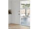 Modern kitchen with white cabinets and stainless steel appliances at 1455 E Tuckey Ln, Phoenix, AZ 85014