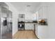 Modern kitchen with stainless steel appliances and white cabinets at 1455 E Tuckey Ln, Phoenix, AZ 85014