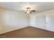 Spacious bedroom with ceiling fan and ample natural light at 20026 N 106Th Ave, Sun City, AZ 85373