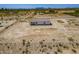 Aerial view showcasing the home's setting in the desert at 2303 S 337Th Ave, Tonopah, AZ 85354