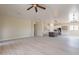 Open concept kitchen with island, stainless steel appliances, and white cabinets at 2303 S 337Th Ave, Tonopah, AZ 85354