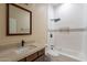 Modern bathroom with updated vanity, bathtub, and stylish tile at 2303 S 337Th Ave, Tonopah, AZ 85354