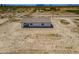 Aerial view showcasing the home's setting in the desert at 2303 S 337Th Ave, Tonopah, AZ 85354