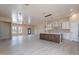 Open concept kitchen with large island, stainless steel appliances, and tile flooring at 2303 S 337Th Ave, Tonopah, AZ 85354