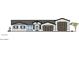 New construction home with 3 car garage and Spanish-style architecture at 2303 S 337Th Ave, Tonopah, AZ 85354