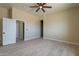 Spacious bedroom with tile flooring and ceiling fan at 2303 S 337Th Ave, Tonopah, AZ 85354