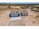 Aerial view of a new construction home with a two car garage at 2303 S 337Th Ave, Tonopah, AZ 85354