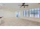 Bright living room with tile floors and large windows at 13066 W Steed Rdg, Peoria, AZ 85383