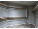 Large walk-in closet with ample shelving and hanging rods at 7951 E Posada Ave, Mesa, AZ 85212
