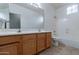 Clean bathroom with double vanity and bathtub at 7951 E Posada Ave, Mesa, AZ 85212