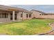Spacious backyard with grassy area at 7951 E Posada Ave, Mesa, AZ 85212