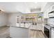 Modern kitchen with granite countertops and stainless steel appliances at 5088 N 83Rd St, Scottsdale, AZ 85250
