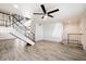 Spacious living room with wood-look tile floors and ceiling fan at 5088 N 83Rd St, Scottsdale, AZ 85250
