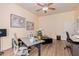 Bright home office with hardwood floors and large desk at 4055 N Recker Rd # 29, Mesa, AZ 85215
