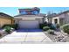 Two-story home with a two-car garage and drought-tolerant landscaping at 4321 E Desert Sky Ct, Cave Creek, AZ 85331
