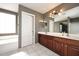 Bathroom with double vanity and a large soaking tub at 4321 E Desert Sky Ct, Cave Creek, AZ 85331