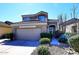 Two-story home with a two-car garage and drought-tolerant landscaping at 4321 E Desert Sky Ct, Cave Creek, AZ 85331