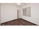 Bright bedroom featuring wood-look flooring and a window with blinds at 4321 E Desert Sky Ct, Cave Creek, AZ 85331