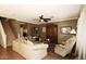 Comfortable living room featuring hardwood floors and ceiling fan at 4321 E Desert Sky Ct, Cave Creek, AZ 85331