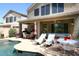 Spacious backyard oasis with a pool, hot tub, and patio furniture at 4321 E Desert Sky Ct, Cave Creek, AZ 85331